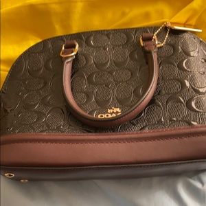 A black coach purse